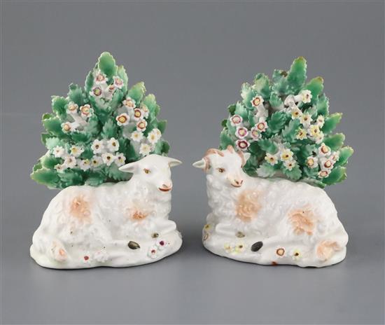 A pair of Derby figures of recumbent sheep, c.1765, H. 10.3cm